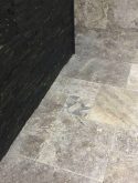 silver travertine paver and black quartzite ledgers